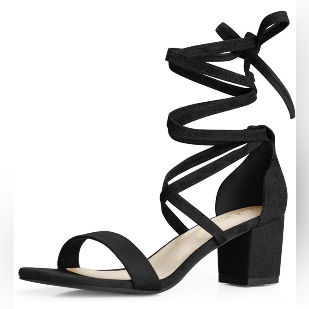 Woman’s black cross-up 2 1/8” heels, size 5.5